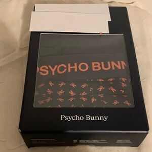 Psycho Bunny Black and Coral Pattern Design